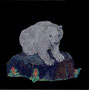 polar cub on rock