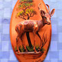 Placa de cobre con el altorrelieve de una gacela saltarina 