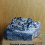 Eine der prächtigen Zinnerzstufen in der mineralogischen Sammlung des Besucherbergwerks
