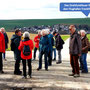 01.04.2026 Kesselbach-Limbach - P1: An der Feldwegekreuzung Sportplatz mit Blick auf Limbach und das Drehpunktfeuer für den Flughafen Frankfurt im Hintergrund.