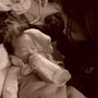 Dec. 2lst 2oo8 Auntie Mylene feeding Darien