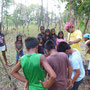 Learning how to plant mango saplings!