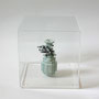 Low pixel CG 「バグる・ノイズ」 - 青磁 -　　　       2012  ceramic,Acryl box  15×15×15(cm)　　個人蔵
