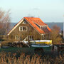 Das Tonnenhaus mit neuer Dacheindeckung im Winter 2003