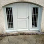 Transformation d'une porte de garage en porte d'entrée