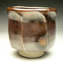 JACK TROY - YUNOMI, STONEWARE, TENMOKU GLAZE WITH HOTTER LIGHTER AREA, GAS FIRED - 10cmH x 10cmD, 0.5kg - #JT22.....SOLD
