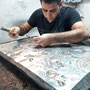 Artigiano nel Bazar di Esfahan, Iran