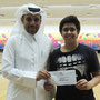 Jassem Al Mureikhi - 2nd Place winner (Youth Category) receiving his cash prize. Awarded by Mr. Saeed Al-hajri - Head of the Technical Committee.