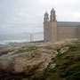 Santuario da Nosa Señora da Barca, Muxía - v pozadí Cabo Vilán