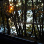 západ slunce z okna přívěsu, Kemp Naturist na Istrii