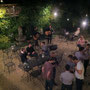 Guests enjoy dinner on our outdoor patio