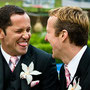 Grooms share a moment