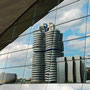REFLECT. reflection of bmw headquarters and plant in bmw welt