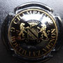 Marque :   BOUTILLEZ - VIGNON N° Lambert : 5 Couleur : Noir et or Description : Blason couronné encadré   de deux lions - nom de la marque   Emplacement : 