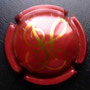 Marque : VERGNON Jean-Louis N° Lambert : 9 Couleur :  Rouge et Or Description : Initiales stylisées  Emplacement : 
