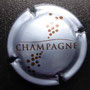 Marque : GENERIQUE  N° Lambert : 765 Couleur : Argent bleuté Description : Inscription Champagne en lettres capitales et bulles  Ref perso : 