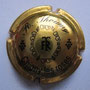 Marque :  THOUMY R N° Lambert : 5 Couleur : Or et Noir Description : Lettres TR dans un cartouche   Emplacement : 102-02-05