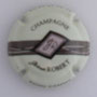 Marque : ROBERT Jérôme N° Lambert : 7a Couleur : Fond crème Description : Initiales JR stylisées dans un cartouche incliné - nom de la marque  Emplacement : 