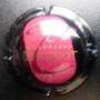 Marque : THIENOT Alain N° Lambert : 21 Couleur : Centre Rouge Description : Lettre T en cursive   au -dessus du nom de la marque  Emplacement : 