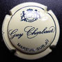 Marque : CHARBAUT Guy N° Lambert : 2 Couleur : Jaune, crème et noir Description : Lettres GC dans un cartouche couronné encadré de deux lions au-dessus du nom du producteur  Emplacement : 