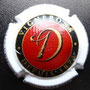 Marque : DUMENIL N∞ Lambert : 34 Couleur : Contour blanc, fond rouge Description : Lettre D dorée dans un cercle rouge Ref perso :