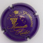 Marque : RACLOT Marinette N° Lambert : 41e Couleur : Violet foncé et or Description : Grappe de raisins et nom de la marque Emplacement : 
