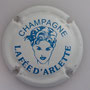Marque : ARLETTE (la fée d’) N° Lambert : 7 Couleur : Blanc et bleu Description : Tête de femme  Ref perso :