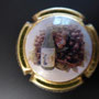 Marque : DELOUVIN - MOREAU N° Lambert : 25 Couleur : Polychrome, contour or Description : Bouteille et raisins  Emplacement : 