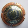 Marque : TSARINE N° Lambert : 6 Couleur : Contour rosé Description : Blason contenant une étoile   servant de corps à un aigle à deux têtes   Emplacement : 102-08-03