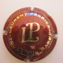Marque : LAURENT - PERRIER  N° Lambert : 56 Couleur : Bordeaux et or Description : Lettres LP sans écusson. Inscription Tours  Emplacement : 