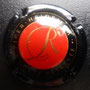 Marque : PIPER-HEIDSIECK N° Lambert : 123 Couleur : Contour noir, cercle   rouge Description : Lettre R cursive   dorée dans un cercle rouge. Cuvée   réservée  Emplacement : 