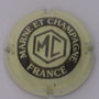 Marque : MARNE & CHAMPAGNE N° Lambert : 3a Couleur : Crème et noir. écriture épaisse Description : Lettres MC dans un hexagone   Emplacement : 