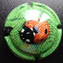 Marque : RAFFLIN Serge N° Lambert : 15 Couleur : Polychrome Description : Coccinelle  Emplacement : 