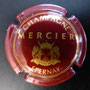 Marque : MERCIER N° Lambert : 16 Couleur : Bordeaux et or brillant Description : Blason couronné, soutenu par deux lions. Bas du blason arrondi  Emplacement : 