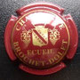 Marque :   BROCHET - DOLET N° Lambert : 7 Couleur :  Bordeaux et or Description : Nom de la marque. Ecusson c ouronné soutenu par deux grappes de raisins  Emplacement : 