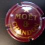 Marque : MOET & CHANDON N° Lambert : 155 Couleur :  Bordeaux et Or Description : Etoile et inscription  MOËT & CHANDON dans un cercle   Emplacement : 080-06-02