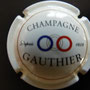 Marque :  GAUTHIER  N° Lambert : 2 Couleur :  Crème, Lettres épaisses Description : 3 cercles de couleur au-dessus du nom du producteur  Emplacement : 054-03-02