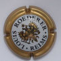 Marque : ROEDERER Louis N° Lambert : 100 Couleur : Contour Or - petit dessin Description : Blason aigle à 2 têtes, tenant dans ses serres 1 sceptre et un globe, écusson central contenant un chevalier en armure.  Emplacement : 