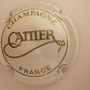 Marque : CATTIER N° Lambert : 2 Couleur : blanc et or Description : Nom du producteur stylisé   Emplacement : 020-05-02