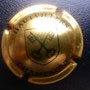 Marque : HAUTVILLERS N° Lambert : 25 Couleur : Or et noir Description : Petit écusson fin. Blason avec deux clés  Emplacement : 