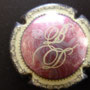 Marque :  DEVAVRY N° Lambert : 2 Couleur :  Centre rosé, contour   gris Description : Initiales stylisées  Emplacement : 044-01-05