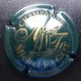 Marque : FAGOT Michel N° Lambert : 16 Couleur : Vert et or Description : Nom du producteur et initiales stylisées  Emplacement : 