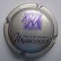 Marque : MARCOULT Michel N° Lambert : 5 Couleur : Argent et Violet  Description : Lettre M fantaisie dans un carré et nom de la marque  Emplacement : 076-03-05