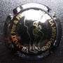 Marque :  VILMART père & fils N° Lambert : 2 Couleur :  Noir et or Description : Angelot jouant du saxo Emplacement : 