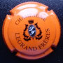 Marque :  LEGRAND Frères N° Lambert : 4 Couleur :  Orange et noir Description : Initiales dans cartouche ovale - Nom de la marque en cercle  Emplacement :