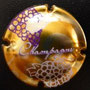 Marque : GENERIQUE  N° Lambert : 685 Couleur : Or, violet et blanc Description : Inscription Champagne en lettres cursives, au-dessus d'une grappe de raisins  Ref perso : 