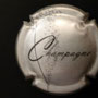 Marque : GENERIQUE  N° Lambert : 757 Couleur : Argent et noir Description : Inscription Champagne en lettres cursives et bulles  Ref perso : 920-08-05