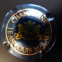 Marque : MALARD JL N° Lambert : 1 Couleur : G dans l'écusson - Bleu métallisé et or Description : Lettre G dans blason couronné, soutenu par deux lions  Emplacement : 074-04-01