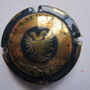 Marque : TSARINE N° Lambert : 4 Couleur : Bleu et or Description : Blason contenant une étoile   servant de corps à un aigle à deux têtes   Emplacement : 102-08-02