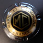 Marque : MARNE & CHAMPAGNE N° Lambert : 12 Couleur : Noir et or brillant - 32 mm  Description : Lettres MC dans un hexagone   Emplacement : 074-07-04